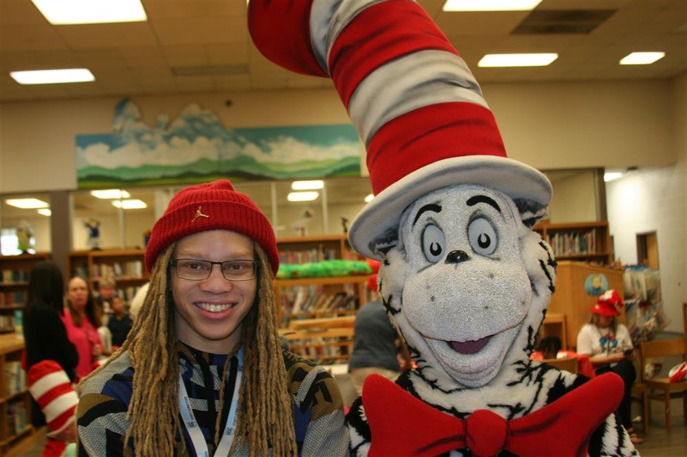 High school student Daymion Winfrey enjoying a quick photo with the Cat in the Hat.